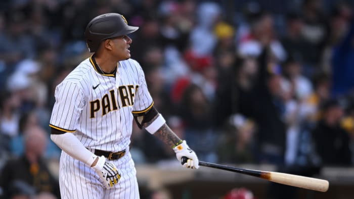 Apr 18, 2022; San Diego, California, USA; San Diego Padres third baseman Manny Machado (13) watches his two-run home run against the Cincinnati Reds during the first inning at Petco Park. Mandatory Credit: Orlando Ramirez-USA TODAY Sports